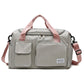 Light grey waterproof travel gym bag with front zip pocket and pink shoulder straps