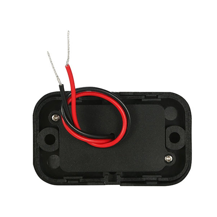 Black charger housing with open terminals and red/black internal wiring