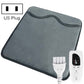 Dark gray electric foot warmer pad with attached cable and controller remote