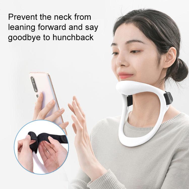White neck support collar with black straps, worn by person holding a phone