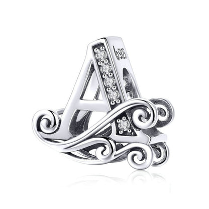 Silver-tone letter A charm with round rhinestones and swirl filigree