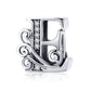 Silver-tone letter E charm with round rhinestones and decorative swirl details