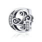 Silver-tone letter G charm with round rhinestones and filigree swirls