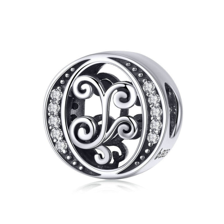 Silver-tone circular ring charm with black enamel and rhinestone border, cursive “O” style