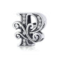 Silver-tone letter charm with black enamel and rhinestone accents, cursive “P” style