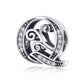 Silver-tone circular ring charm with black enamel scrollwork and rhinestone border, “Q”