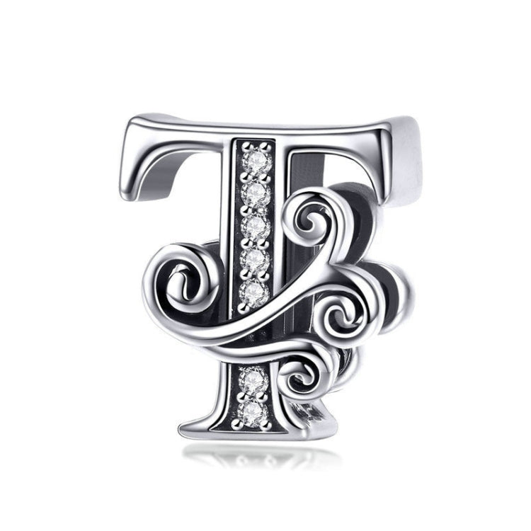 Silver-tone letter charm with black enamel and rhinestone center row, cursive “T” style