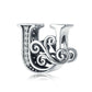 Silver letter charm with black enamel and sparkling zircon inlay rows