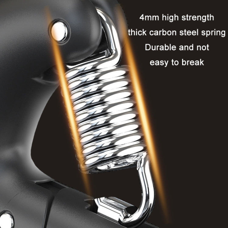 Close-up of the thick carbon steel spring and gripper on the electronic trainer