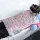 Light gray electric heated shoulder and neck guard with heating tubes and power cable