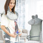Light gray electric heated shoulder and neck guard with front straps and button tabs
