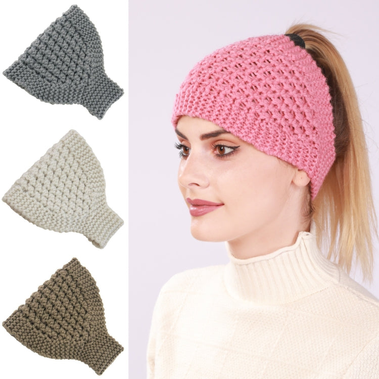 Knitted ear-warm headband on model, pink, wide crochet design