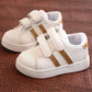 Children's white casual sneakers with gold striped velcro straps