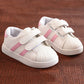 Children's white casual sneakers with pink striped velcro straps