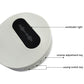 White wireless doorbell front with black sound slot, side keys for volume and song