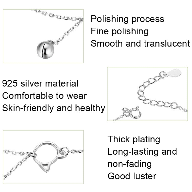 Silver chain anklet detail with round bell charm and teardrop link