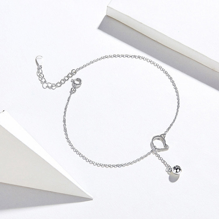 Silver cat bell anklet with heart-teardrop charm and small bell dangle