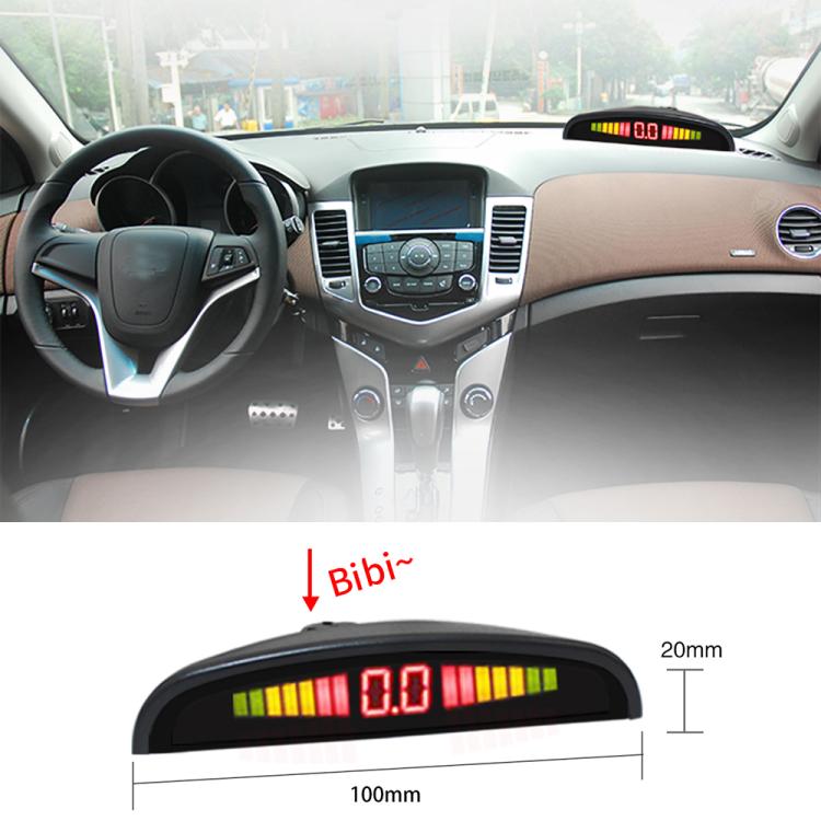 Car parking sensor LCD display in vehicle dashboard with red and green warning bars