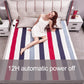 Electric blanket on bed with bold vertical stripes in red, blue, and white; soft top surface