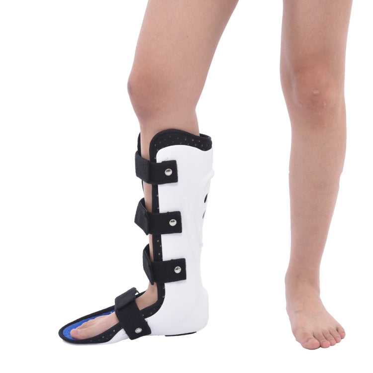 White ankle-foot brace with black buckles and straps, worn on a foot, side view