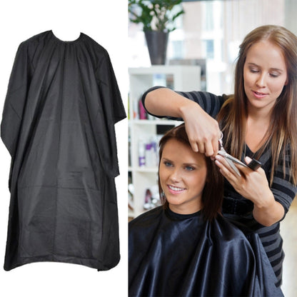 Black waterproof salon apron cape with neck opening and full coverage drape