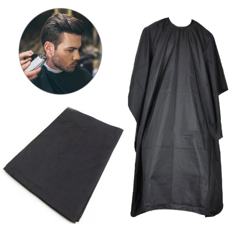 Black salon hairdressing apron cape with matching cloth panel and fold