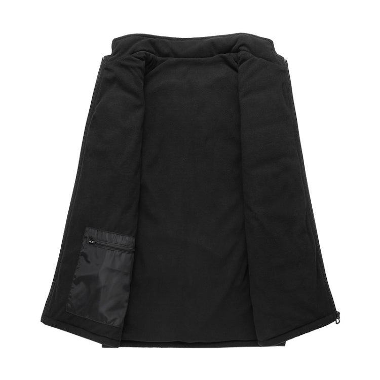 Black heated electric vest with zip-front and stand collar, laid flat