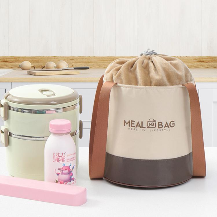 Beige round lunch bag with drawstring and handles, shown with other meal containers