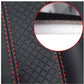Close-up of textured leather seat belt cover with red stitching and stitched edge