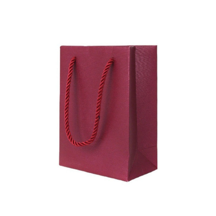 Wine red PU leather gift bag with rope handles and smooth rectangular sides