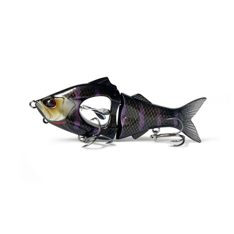 Purple and black multi-section fishing lure with red eye and metal treble hooks
