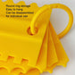 Yellow plastic cake flattener scraper with hanging ring and sawtooth edges