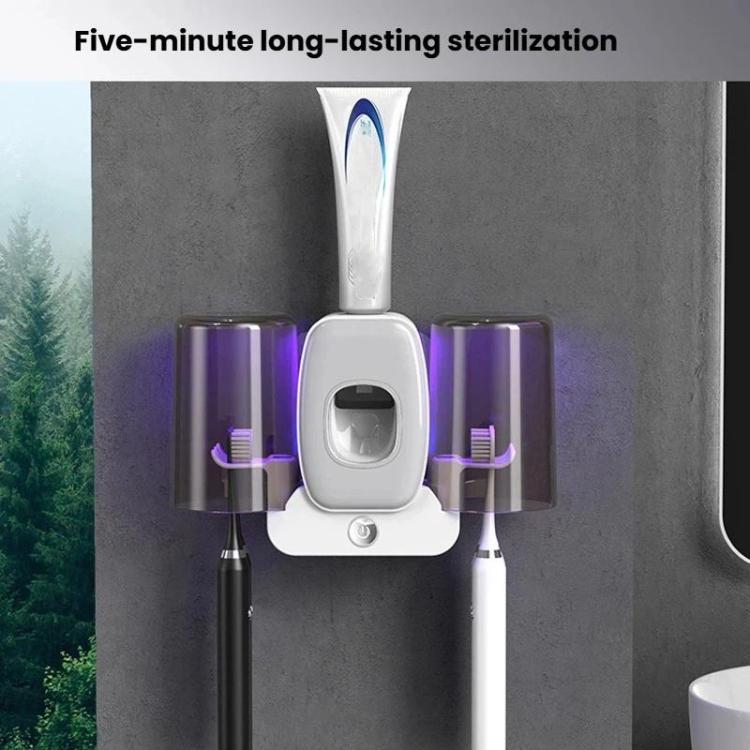 Front view wall-mounted UV toothbrush sanitizer rack with white housing and brush slots