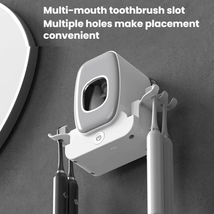 Wall-mounted UV toothbrush sanitizer rack with gray multi-brush slot and two toothbrush holders