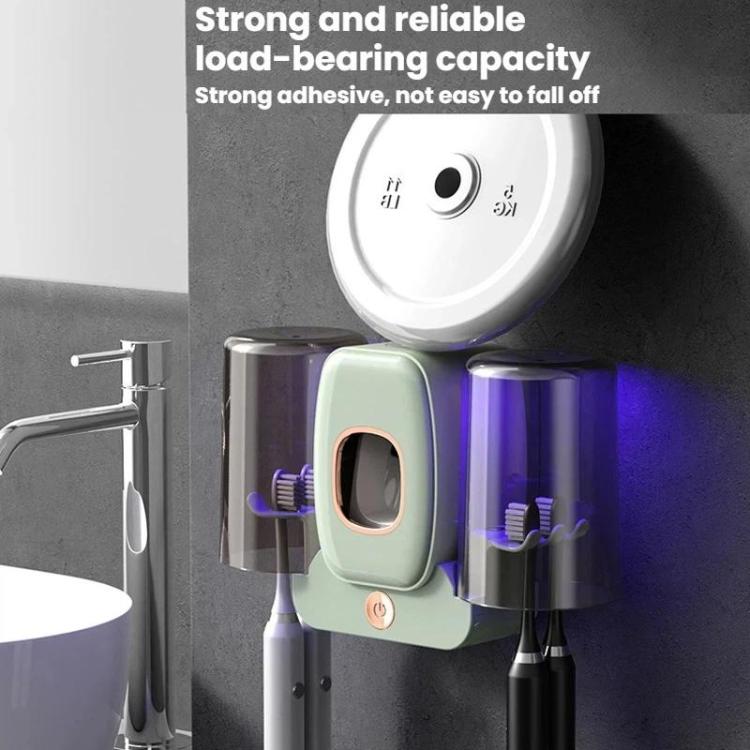 Wall-mounted UV toothbrush sanitizer rack with mint base and two dark cup holders