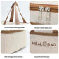 Cream lunch bag with brown handles, metal zipper pulls, and side storage mesh pockets