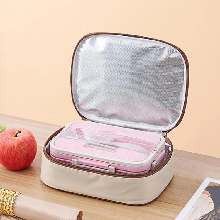 Cream insulated lunch bag opened, showing pink insert and silver-lined interior