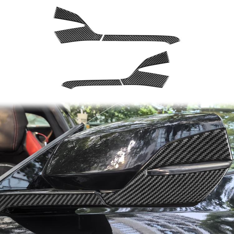Carbon-fiber rearview mirror overlay stickers applied to side mirror on car