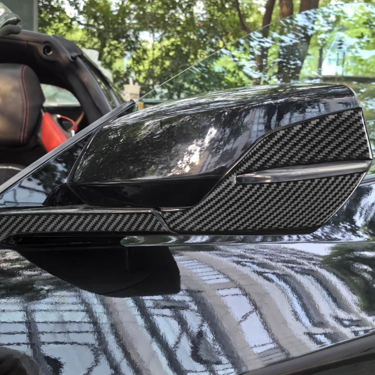 Carbon-fiber rearview mirror overlay stickers on exterior mirror housing