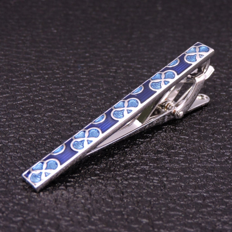 Silver tie clip with blue floral pattern stripe and hinged clasp