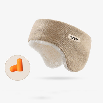 Beige fleece-lined sleep earmuffs with earplug tips and small logo patch