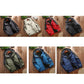 Assorted men's outdoor jackets: black, ivory, red, green, and blue with hoods