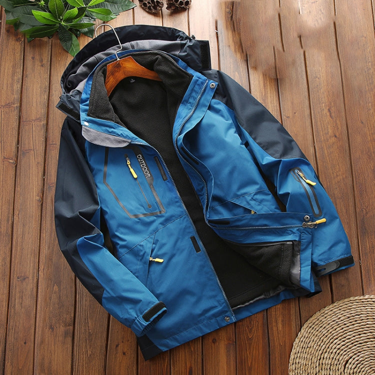 Men's insulated outdoor jacket with fleece-lined hood, blue and black, zip chest pocket