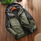 Men's insulated outdoor jacket with fleece-lined interior, dark green and black, front zip closure