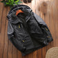 Men's black hooded hiking jacket with fleece lining, zip front, and side pockets