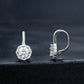 Silver lever-back earrings with round center stone and halo of small crystals