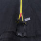 Outdoor trampoline safety net closeup with zipper and black hook strap