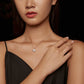 Moissanite pendant necklace worn on neckline, round sparkling halo pendant