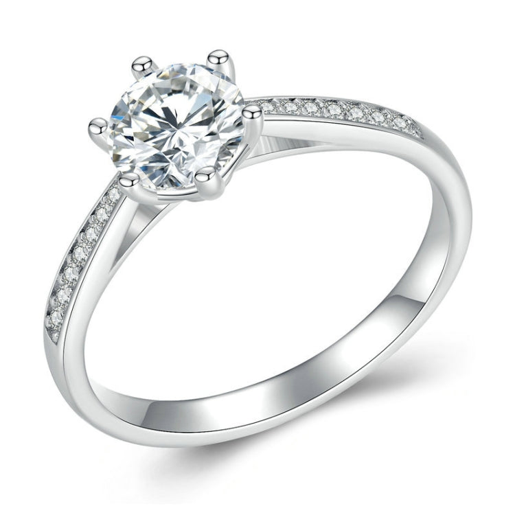 White gold plated moissanite ring with round center stone and six-prong setting