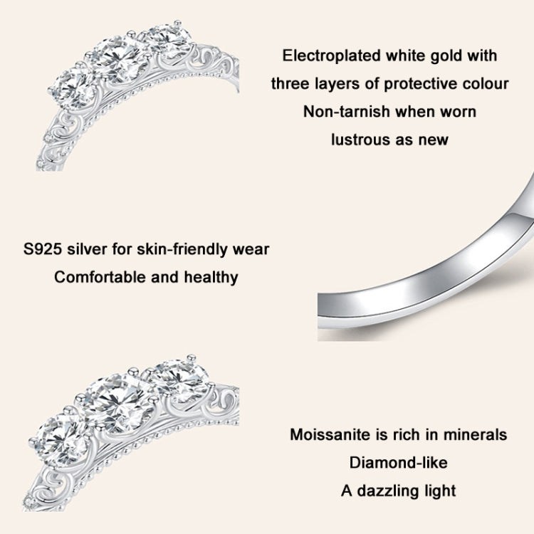 Sterling silver ring detail with ornate band and round moissanite-style stones